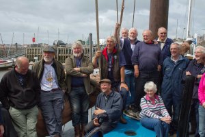 Skippers and crew viewing the presentation of "Reaper"